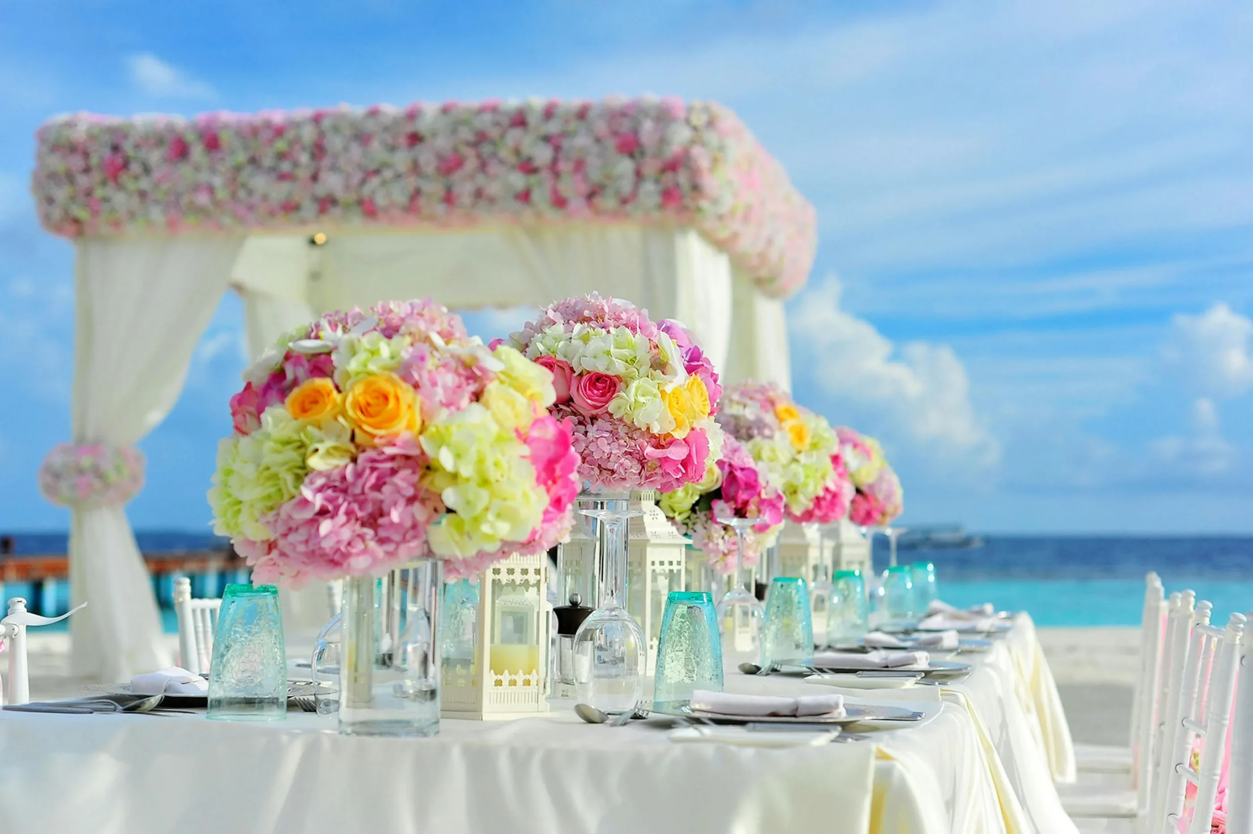 wedding table setup with elegant white linen