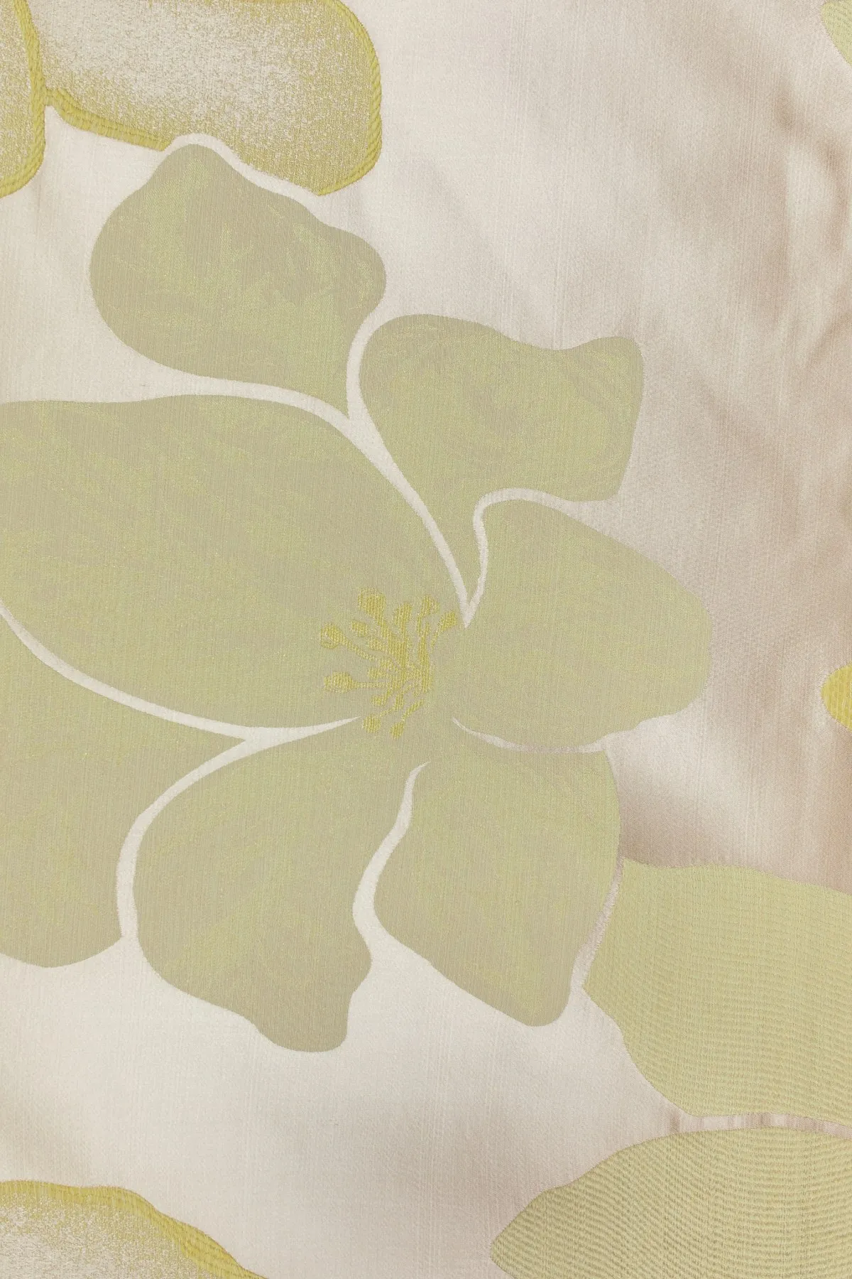 Close-up of gold floral pattern on custom event table linen. - Curated Linen Collection Close-up of gold floral pattern on custom event table linen.