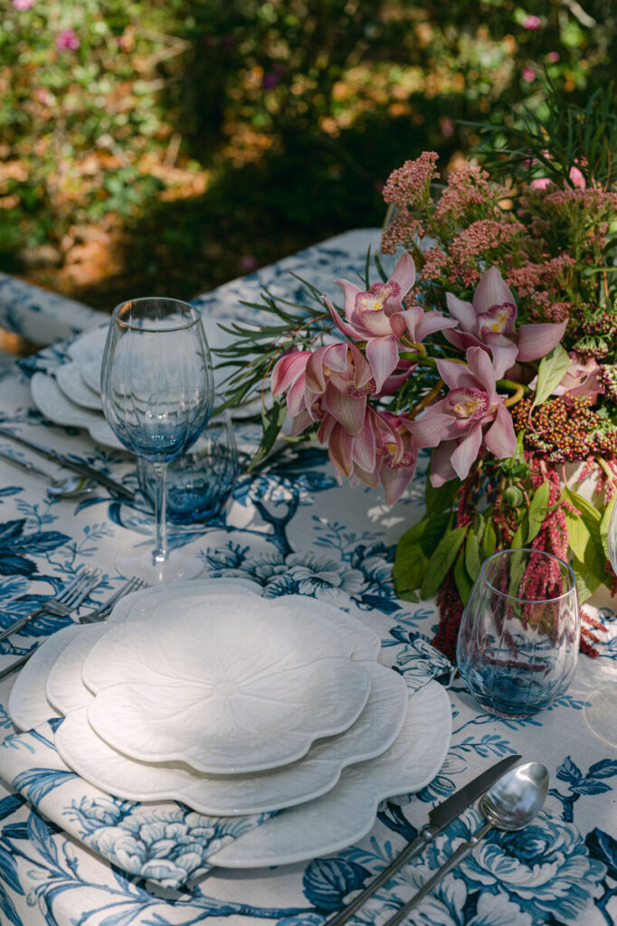 - Curated Linen Collection Wedding head table with layered linens and detailed decorative accents