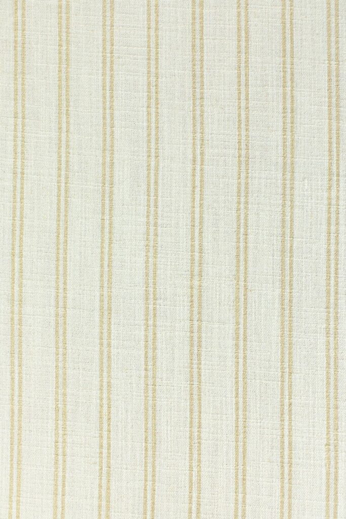 - Curated Linen Collection Close-up of luxury linen fabric showing fine texture and weave detail