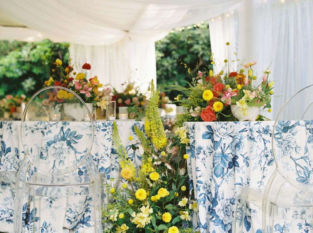 Luxury linen tablecloths adding warmth to industrial event space
