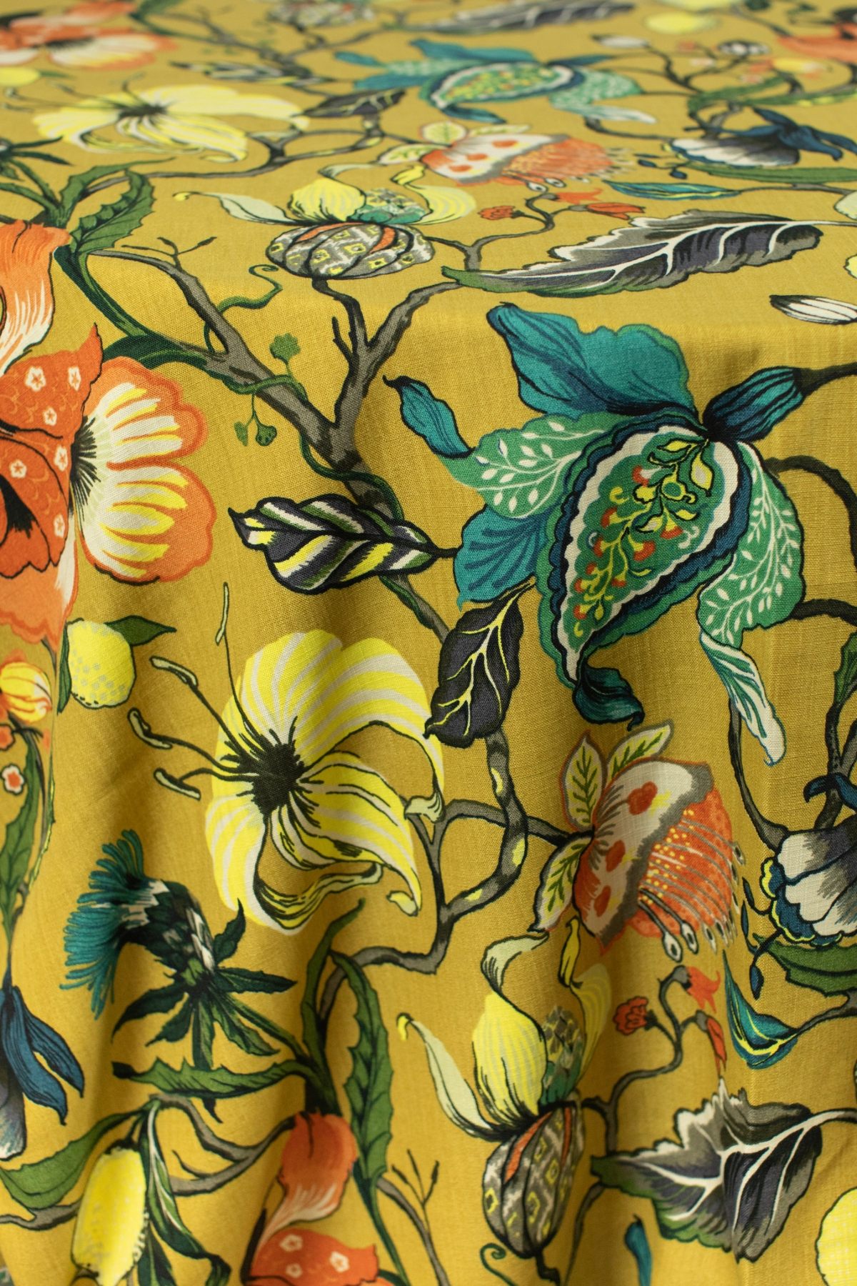 - Curated Linen Collection A floral table linen with mustard base