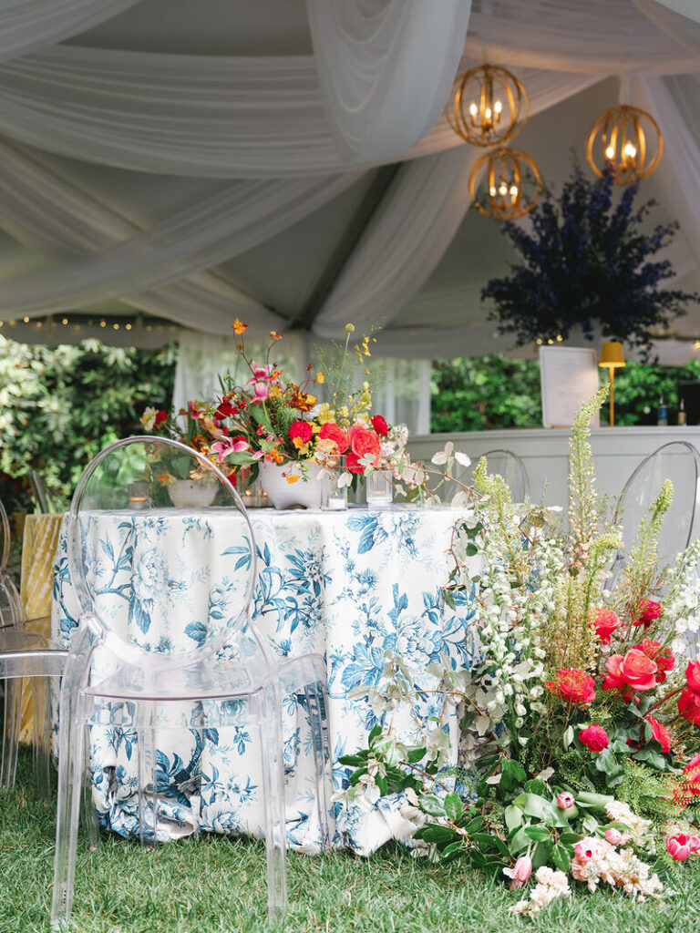 Blue floral linen with colorful flowers for an elegant event - Curated Linen Collection Blue floral linen with colorful flowers for an elegant event