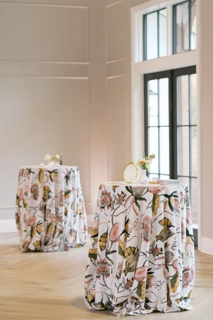 Botanical cocktail tables in a bright reception space - Curated Linen Collection Botanical cocktail tables in a bright reception space
